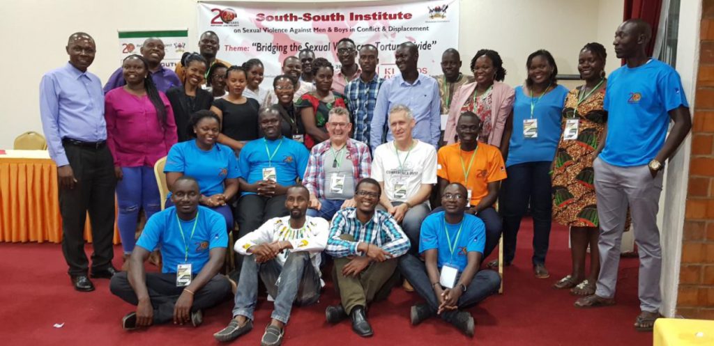 Ken Clearwater (centre) with participants in the 4th SSI conference in Kampala in May 2019